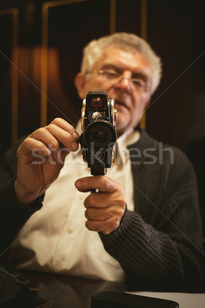 Senior Man Holding Video Camera Stock photo © MilanMarkovic78