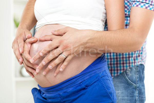 Pregnant belly. Stock photo © MilanMarkovic78