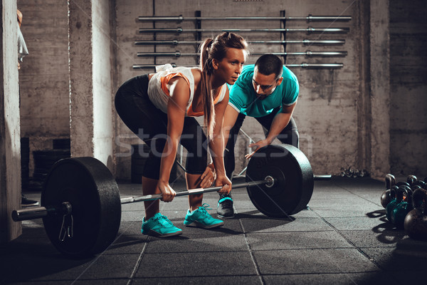 Formation jeune femme exercice gymnase coach [[stock_photo]] © MilanMarkovic78