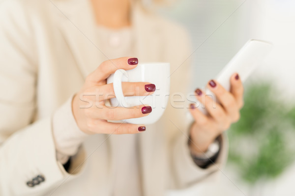 Businesswoman Using Phone Stock photo © MilanMarkovic78