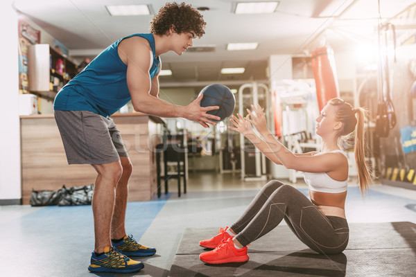 Girl Exercising With Instructor Stock photo © MilanMarkovic78