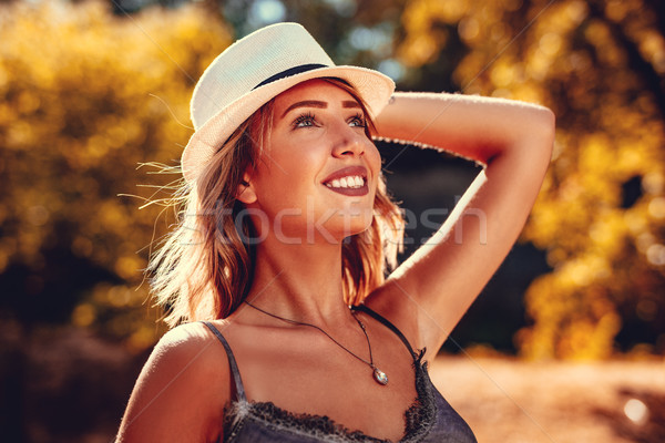 Happy Girl In Autumn Park Stock photo © MilanMarkovic78