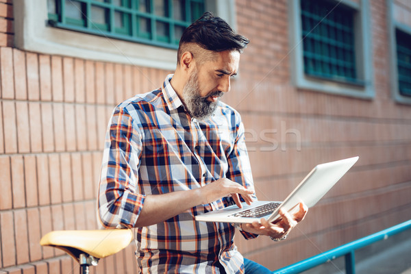 Handsome Man Working On A Break Stock photo © MilanMarkovic78