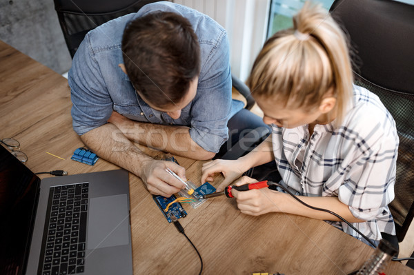 Engineers Working On Circuit Board Stock photo © MilanMarkovic78