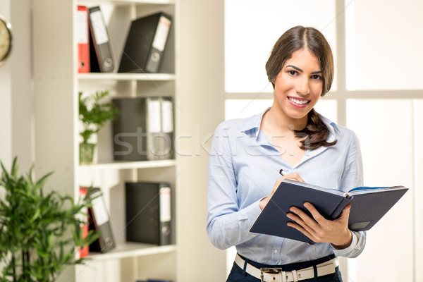 Young Businesswoman With Planner Stock photo © MilanMarkovic78