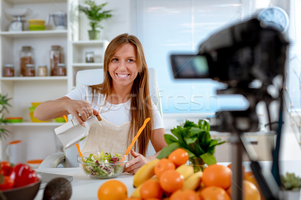 Attractive Blogger Girl Making Video For You Stock photo © MilanMarkovic78