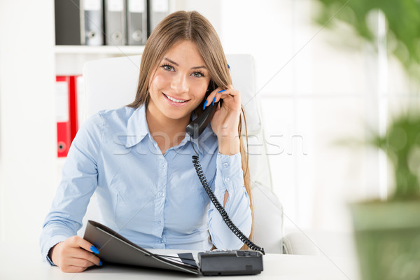 Businesswoman Phoning Stock photo © MilanMarkovic78