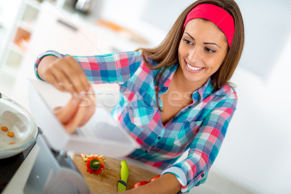 Stock photo: She's A Pro In The Kitchen