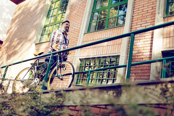 Handsome Man With Bike Stock photo © MilanMarkovic78