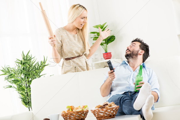 Lazy Husband And Angry Woman Stock photo © MilanMarkovic78