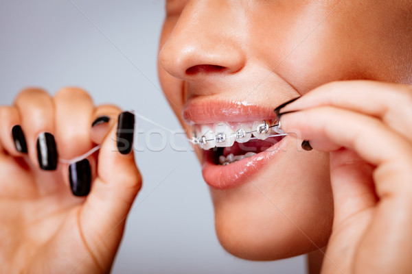 Cleaning Teeth With Dental Floss Stock photo © MilanMarkovic78