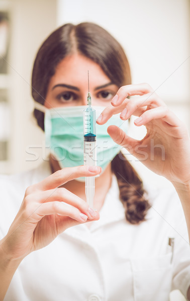 вакцинация довольно молодые медсестры инъекций анестезия Сток-фото © MilanMarkovic78
