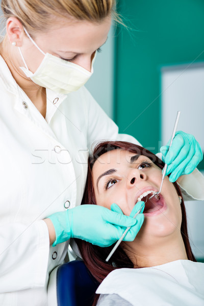 Zahnärztliche Prüfung jungen weiblichen Zahnarzt Zahnhygiene Stock foto © MilanMarkovic78