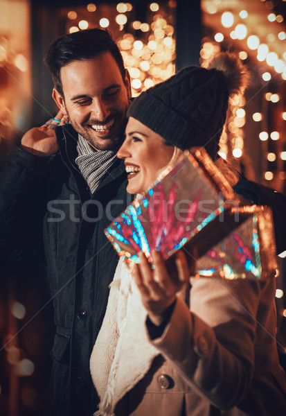 Happy Young Couple With Presents Stock photo © MilanMarkovic78