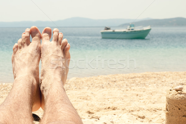 Arenoso Pe Homem Relaxante Praia Foto Stock C Milan Markovic Milanmarkovic78 7080929 Stockfresh