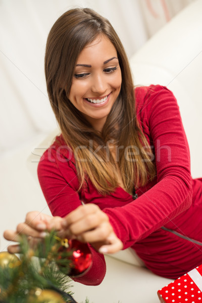 Girl Decorating Christmas Tree Stock photo © MilanMarkovic78