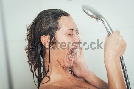 Woman In The Bathroom Stock photo © MilanMarkovic78