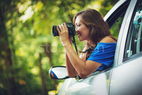 Speicher jungen schöne Frau Sitzung Auto Stock foto © MilanMarkovic78