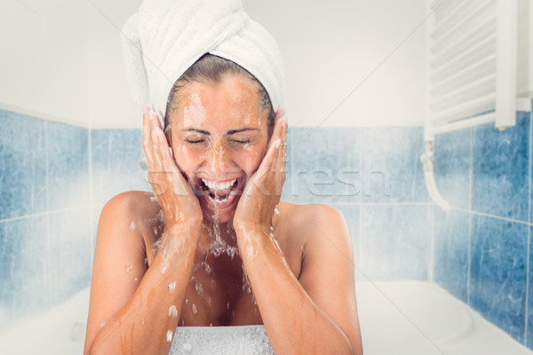 Young Woman Washing The Face Stock photo © MilanMarkovic78