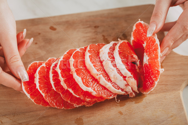 Piros grapefruit közelkép szeletel konyha tábla Stock fotó © MilanMarkovic78