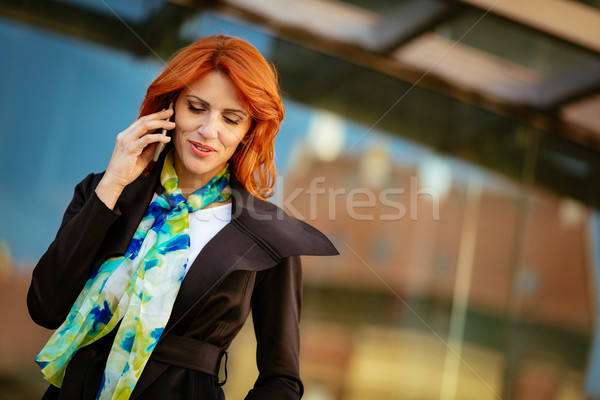 Businesswoman Talking On Smartphone Stock photo © MilanMarkovic78