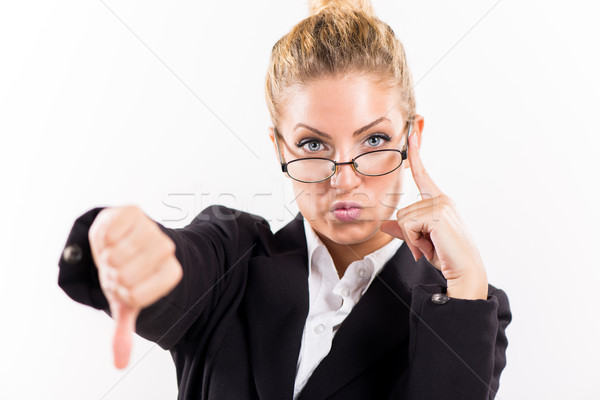 Businesswoman showing thumbs down Stock photo © MilanMarkovic78