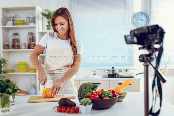 Attractive Blogger Girl Making Video For You Stock photo © MilanMarkovic78