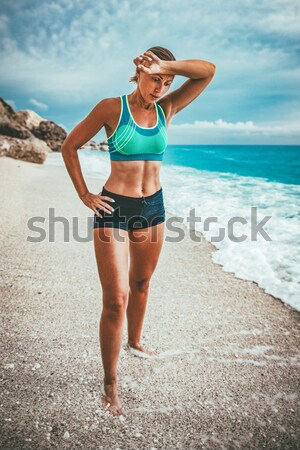 訓練 美しい 若い女性 リラックス ビーチ ストックフォト © MilanMarkovic78