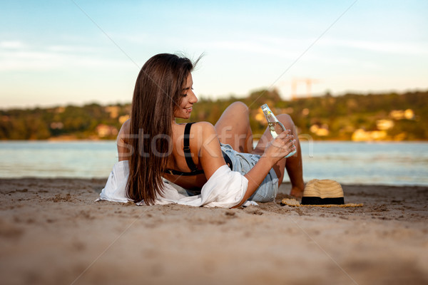 Nyár higgadtság fiatal nő megnyugtató naplemente idő Stock fotó © MilanMarkovic78