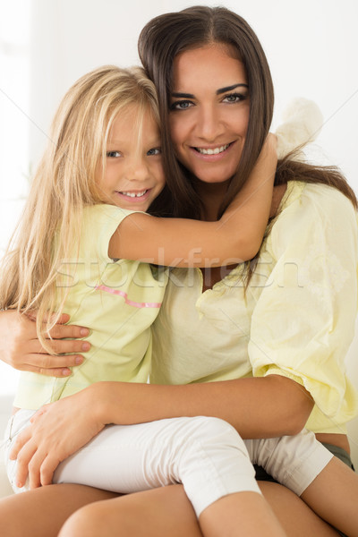 Studio portrait of mother and daughter - Stock Image - F010/0966 - Science Photo Library