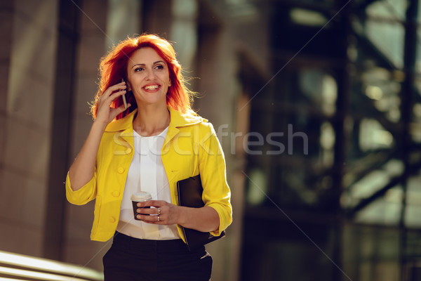 Businesswoman Talking On Smartphone Stock photo © MilanMarkovic78