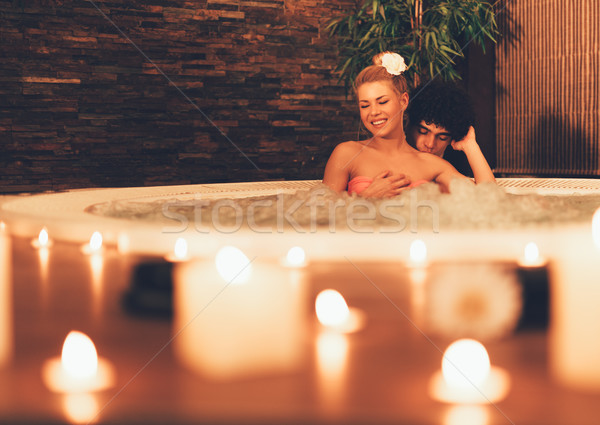 Coppia rilassante jacuzzi bella Foto d'archivio © MilanMarkovic78