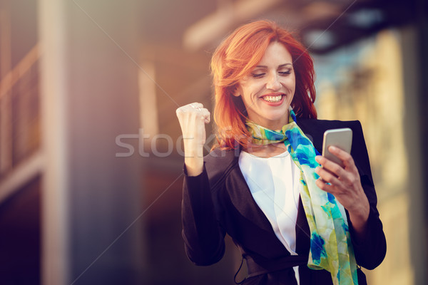 Happy Businesswoman After A Successful Meeting Stock photo © MilanMarkovic78