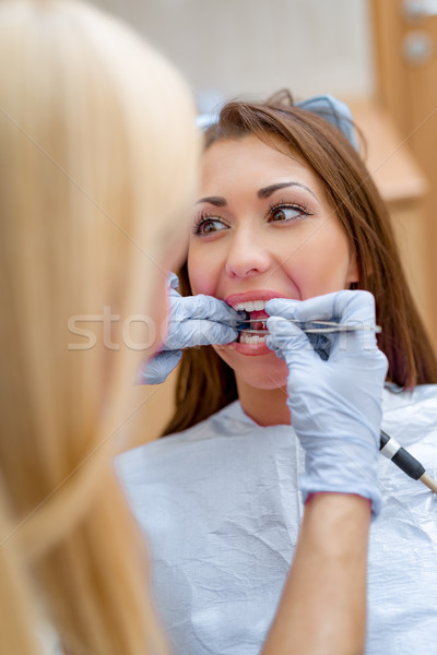 Stockfoto: Tandheelkundige · overleg · mooie · jonge · glimlachende · vrouw · bezoeken