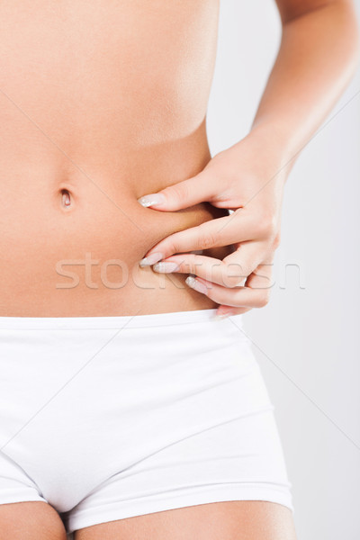 Fat on a waist Stock photo © MilanMarkovic78