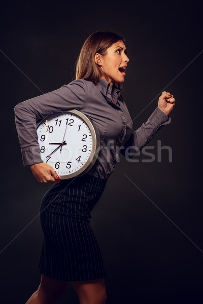Urgente imprenditrice fretta esecuzione clock Foto d'archivio © MilanMarkovic78