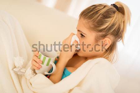 Girl With A Sniffle Stock photo © MilanMarkovic78