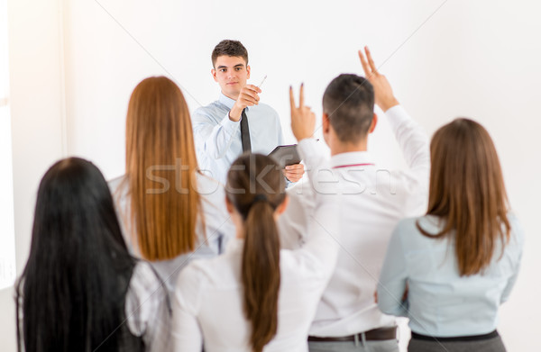 Businessman Answering The Questions Stock photo © MilanMarkovic78