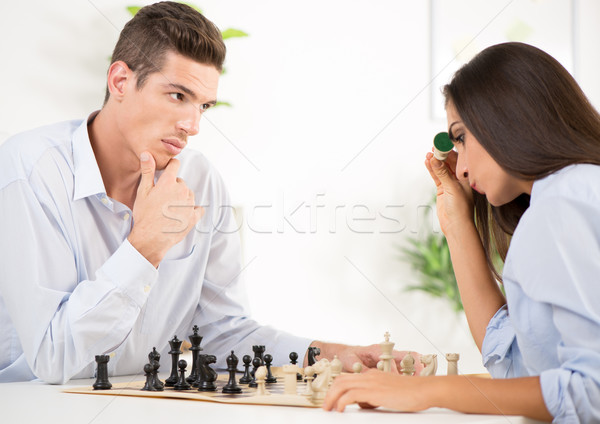 Negocios desafiar jóvenes empresario mujer de negocios jugando Foto stock © MilanMarkovic78