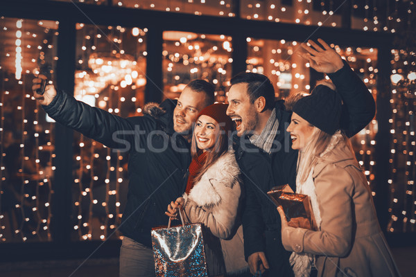 Young Friends Having Fun On Shopping Mall Stock photo © MilanMarkovic78