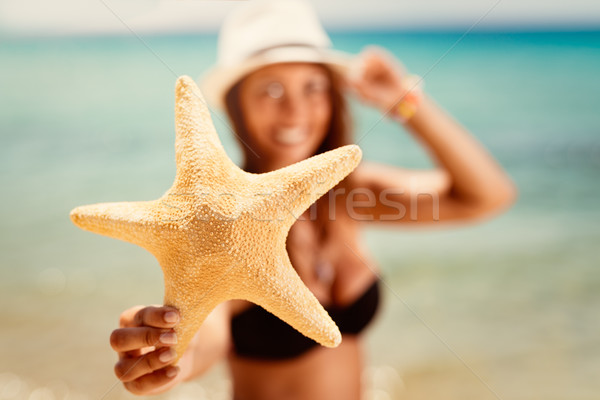Summer Girl With Starfish Stock photo © MilanMarkovic78
