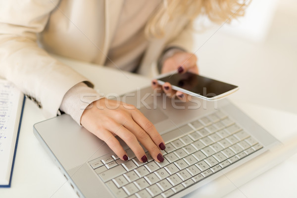 Businesswoman Using Phone Stock photo © MilanMarkovic78