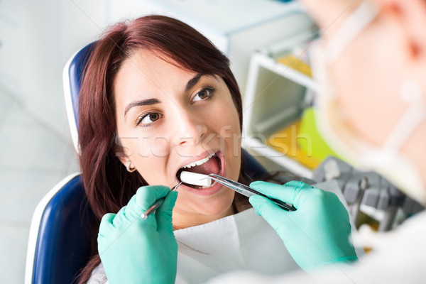 Preparing patient for a dental treatment Stock photo © MilanMarkovic78