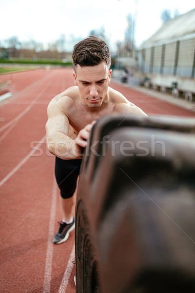 Caber forte jovem muscular homem Foto stock © MilanMarkovic78