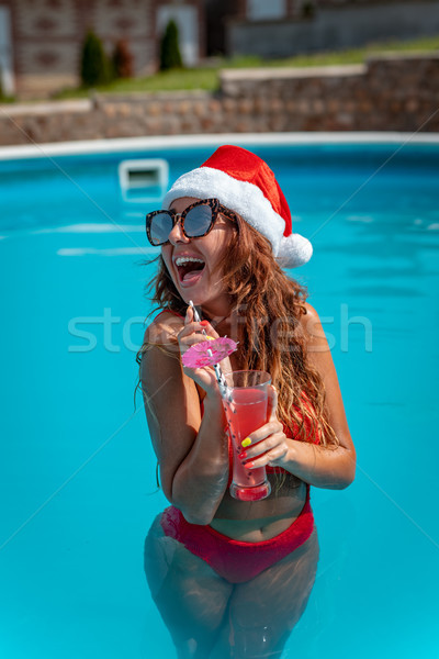 Loco tropicales año nuevo jóvenes mujer hermosa piscina Foto stock © MilanMarkovic78