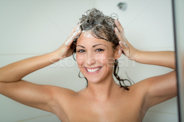 Ragazza lavaggio capelli bella sorridere Foto d'archivio © MilanMarkovic78