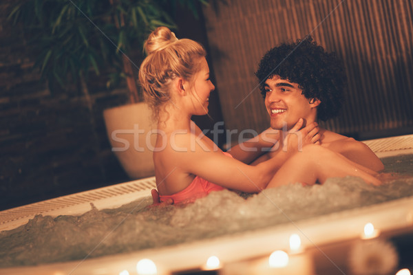 Coppia rilassante jacuzzi bella Foto d'archivio © MilanMarkovic78
