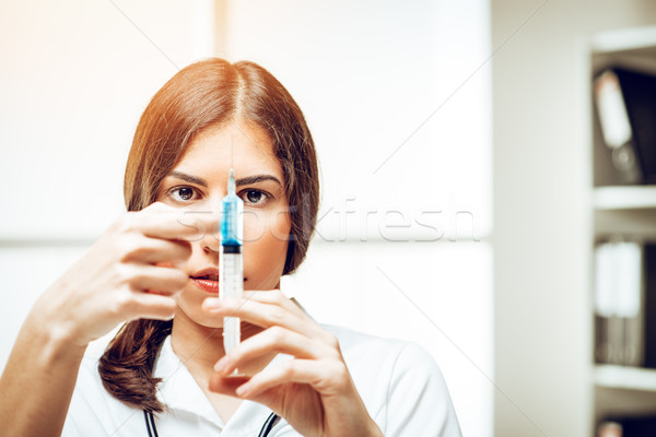 Pracy zobowiązanie skupić młodych kobiet pielęgniarki Zdjęcia stock © MilanMarkovic78