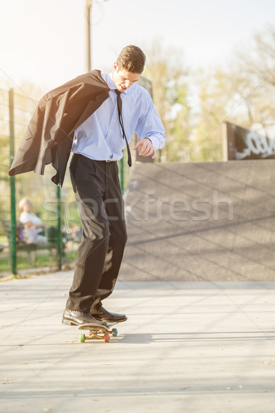 Businessman On Skateboard Stock photo © MilanMarkovic78