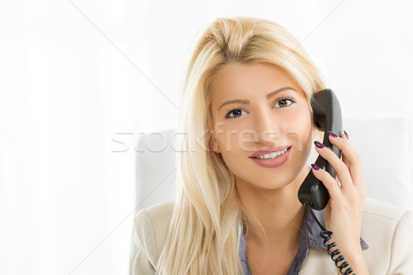 Businesswoman Phoning Stock photo © MilanMarkovic78